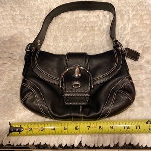 Black coach shoulder clutch